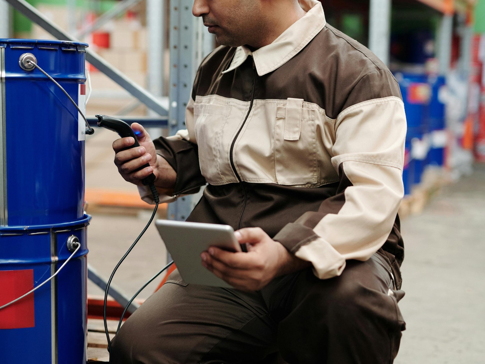 worker-scanning-goods-in-warehouse